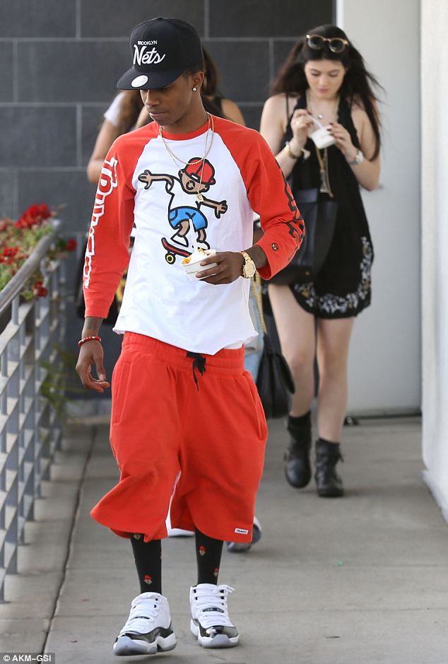 Cooling off: Kylie and Lil Twist stopped off to pick up a frozen yoghurt with their friends