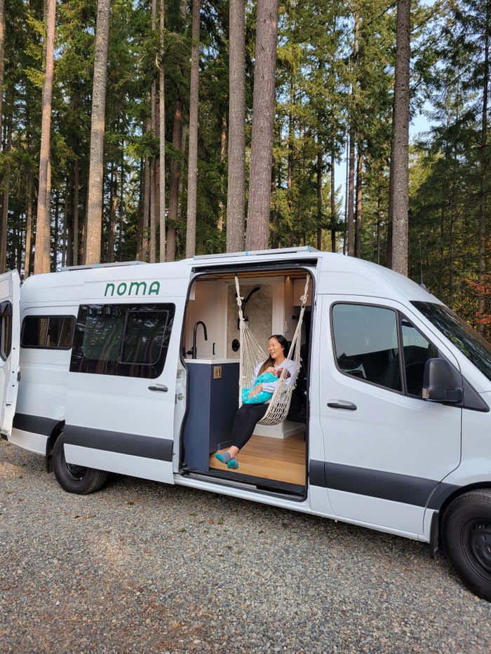 Reid's wife hangs out in a hammock in a van entry way