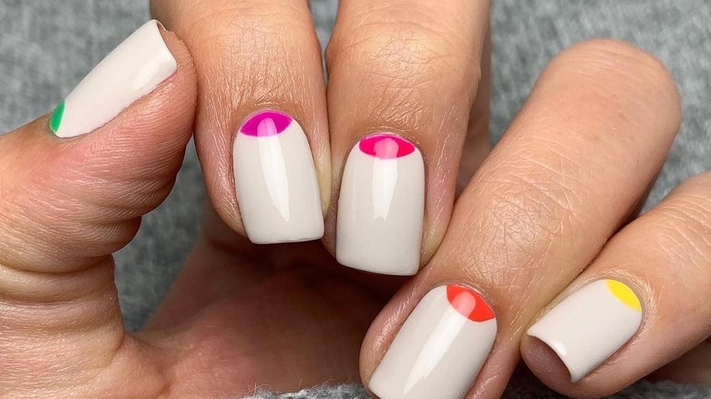 White manicure with rainbow cuticles