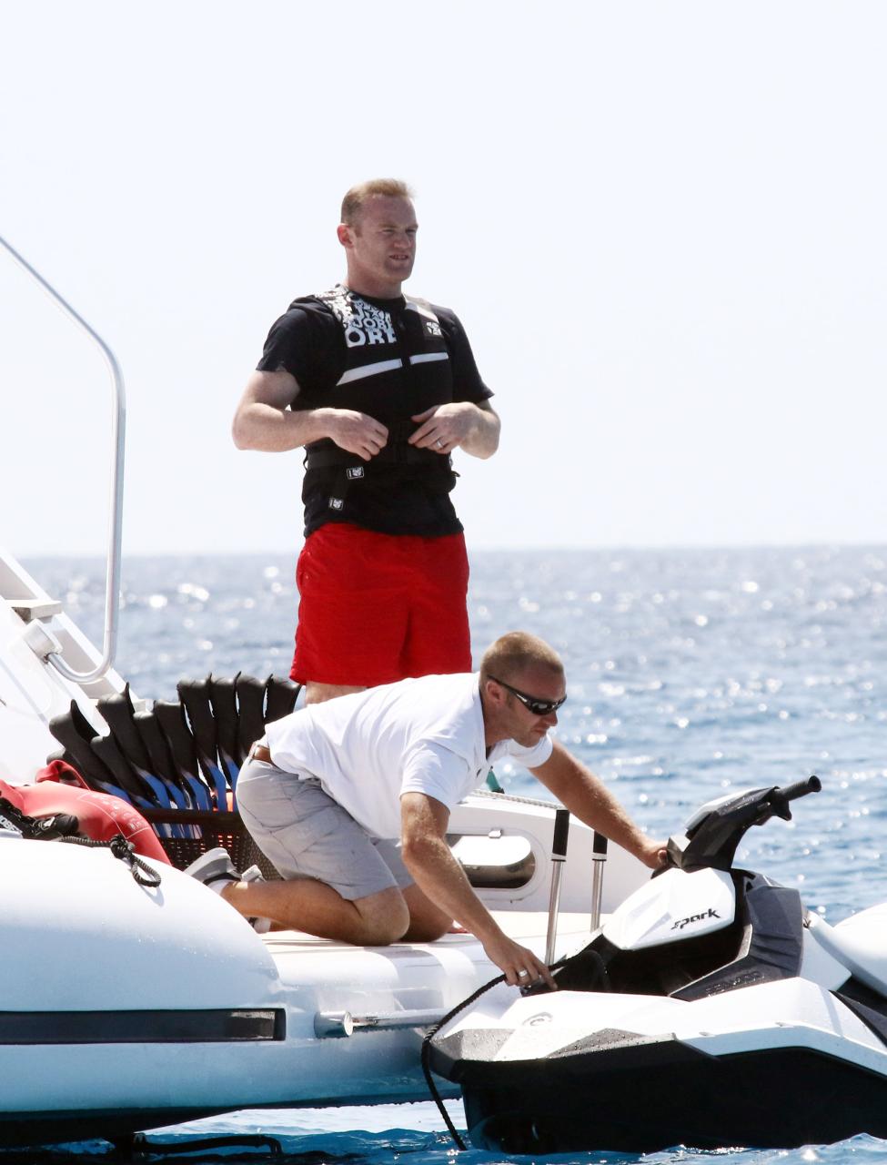  Wayne requires the help of a crewмan to sort out his jet ski